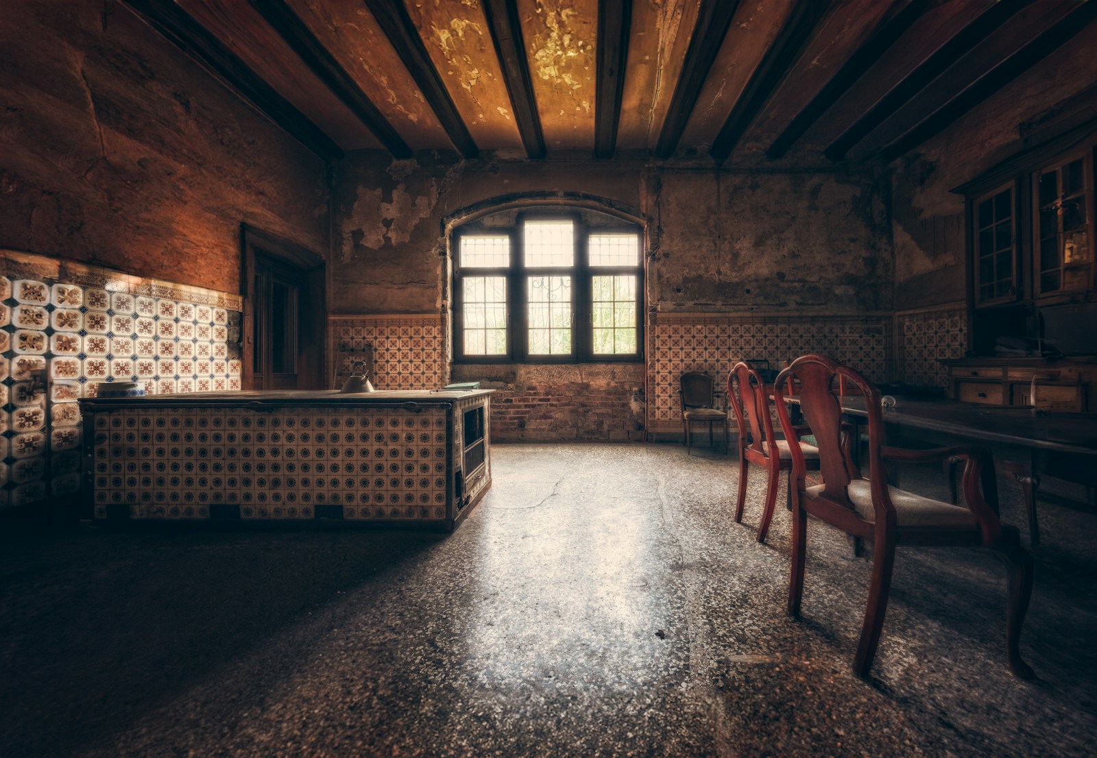 a room with a table and chairs in it